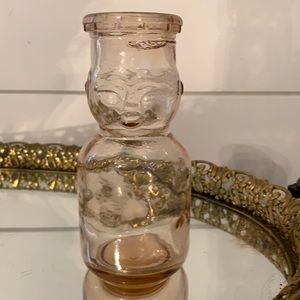 Vintage pink glass dairy bottle